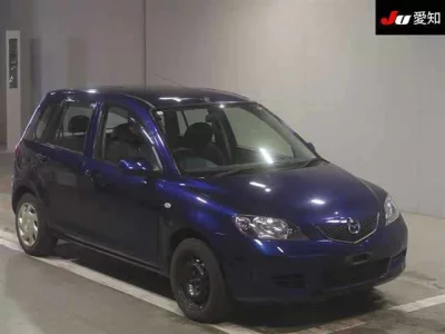 Mazda DEMIO  с аукциона в Японии