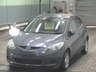 Mazda DEMIO  с аукциона в Японии