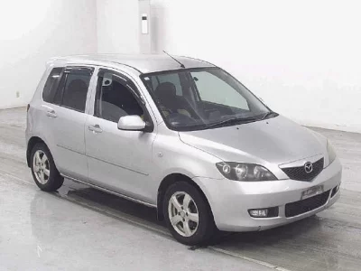 Mazda DEMIO  с аукциона в Японии