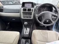 Mitsubishi PAJERO IO лот № 1820 оценка RA  с аукциона в Японии 3