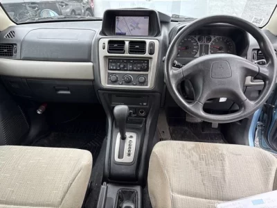 Mitsubishi PAJERO IO  с аукциона в Японии