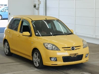 Mazda DEMIO  с аукциона в Японии
