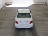 Toyota COROLLA AXIO лот № 2415 оценка 3.5  с аукциона в Японии 2