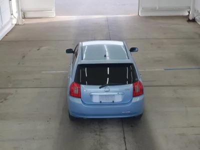 Toyota COROLLA RUNX  с аукциона в Японии