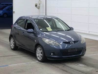 Mazda DEMIO  с аукциона в Японии
