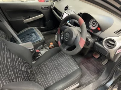 Mazda DEMIO  с аукциона в Японии