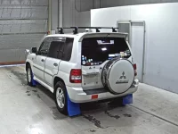 Mitsubishi PAJERO IO лот № 5046 оценка 3  с аукциона в Японии 1