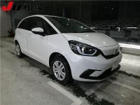 Honda FIT лот № 1304 оценка 4  с аукциона в Японии 7