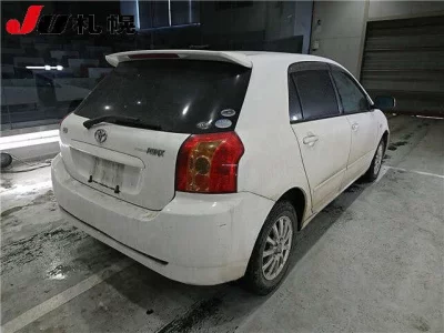 Toyota COROLLA RUNX  с аукциона в Японии