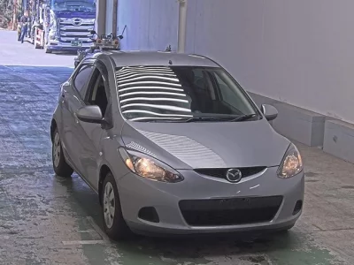 Mazda DEMIO  с аукциона в Японии