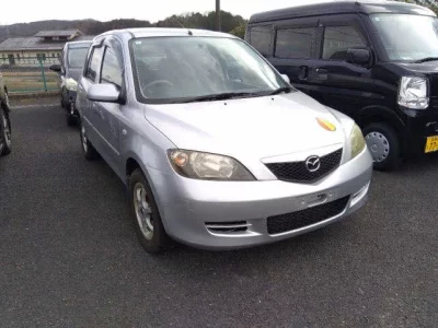 Mazda DEMIO  с аукциона в Японии