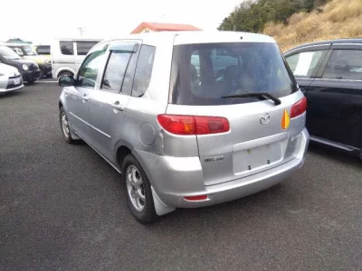 Mazda DEMIO  с аукциона в Японии