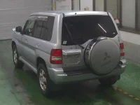 Mitsubishi PAJERO IO лот № 215 оценка 3  с аукциона в Японии 1