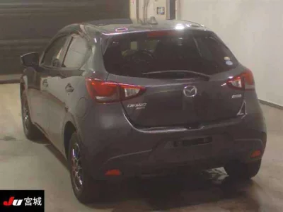 Mazda DEMIO  с аукциона в Японии