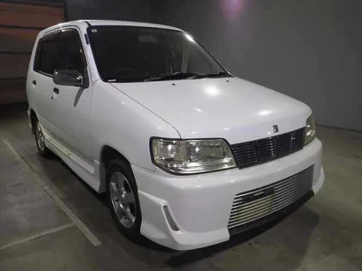 Nissan CUBE  с аукциона в Японии
