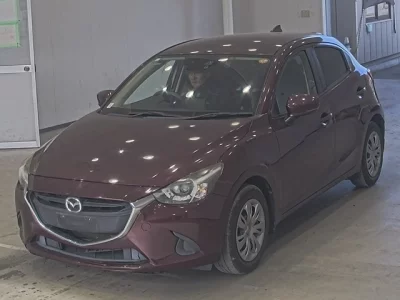 Mazda DEMIO  с аукциона в Японии