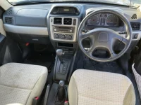 Mitsubishi PAJERO IO лот № 20313 оценка RA  с аукциона в Японии 3