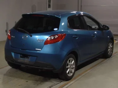 Mazda DEMIO  с аукциона в Японии