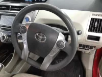 Toyota PRIUS ALPHA лот № 30079 оценка 3.5  с аукциона в Японии 6