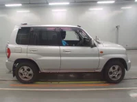 Mitsubishi PAJERO IO лот № 10064 оценка 3.5  с аукциона в Японии 2