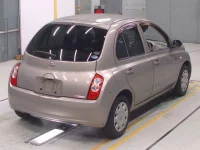 Nissan MARCH лот № 10015 оценка 3.5  с аукциона в Японии 1