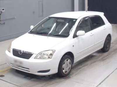 Toyota COROLLA RUNX  с аукциона в Японии