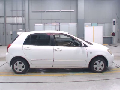 Toyota COROLLA RUNX  с аукциона в Японии