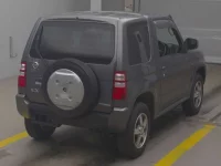 Nissan KIX лот № 3058 оценка R  с аукциона в Японии 1