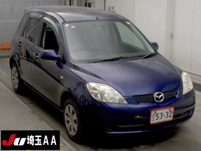 Mazda DEMIO  с аукциона в Японии
