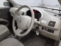 Nissan MARCH лот № 5557 оценка 3.5  с аукциона в Японии 6