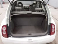 Nissan MARCH лот № 5557 оценка 3.5  с аукциона в Японии 10