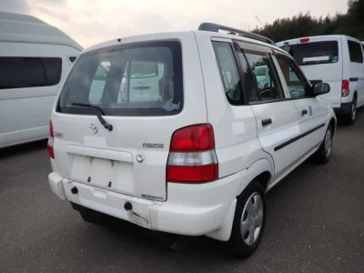 Mazda DEMIO  с аукциона в Японии