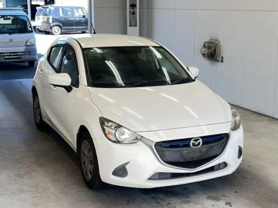 Mazda DEMIO  с аукциона в Японии
