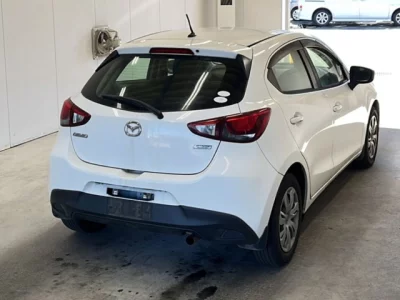 Mazda DEMIO  с аукциона в Японии