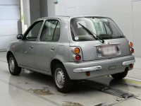 Nissan MARCH лот № 90468 оценка 3.5  с аукциона в Японии 5