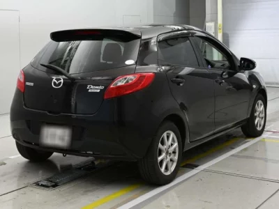 Mazda DEMIO  с аукциона в Японии