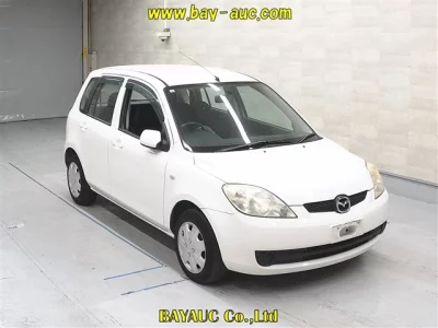 Mazda DEMIO  с аукциона в Японии