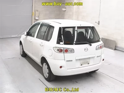 Mazda DEMIO  с аукциона в Японии