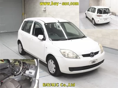 Mazda DEMIO  с аукциона в Японии