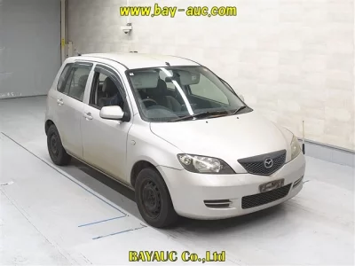 Mazda DEMIO  с аукциона в Японии