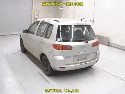 Mazda DEMIO  с аукциона в Японии
