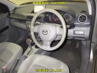 Mazda DEMIO  с аукциона в Японии