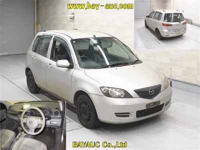 Mazda DEMIO  с аукциона в Японии
