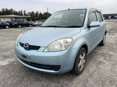 Mazda DEMIO  с аукциона в Японии