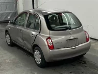 Nissan MARCH лот № 80071 оценка X  с аукциона в Японии 1