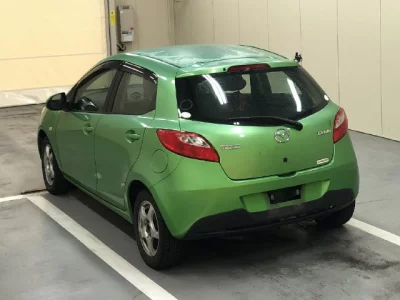 Mazda DEMIO  с аукциона в Японии