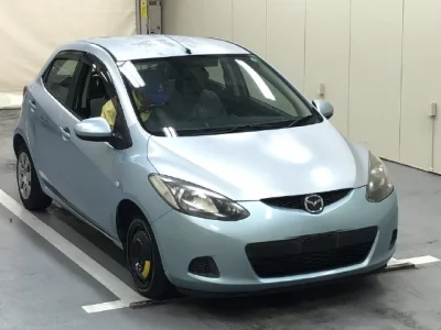 Mazda DEMIO  с аукциона в Японии