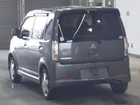 Mitsubishi EK SPORTS лот № 2049 оценка 3  с аукциона в Японии 1