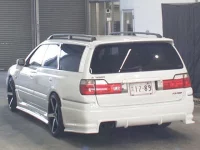 Nissan STAGEA лот № 2601 оценка 3.5  с аукциона в Японии 1