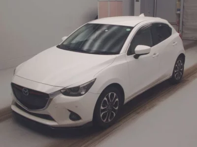 Mazda DEMIO  с аукциона в Японии